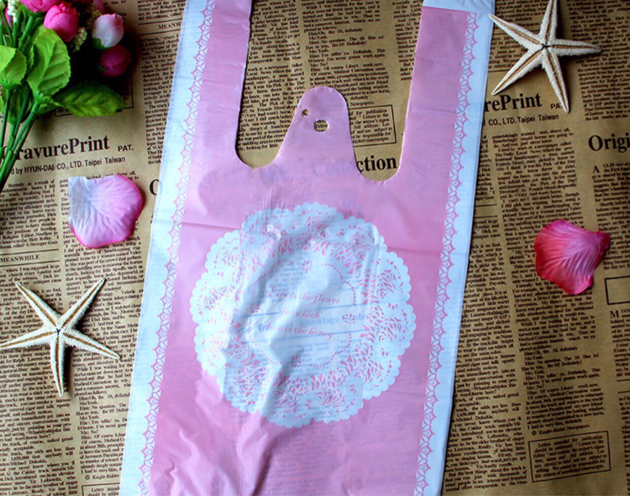 ถุงหูหิ้ว สีชมพู (100 ใบ/แพ็ค) size: 18+10*35