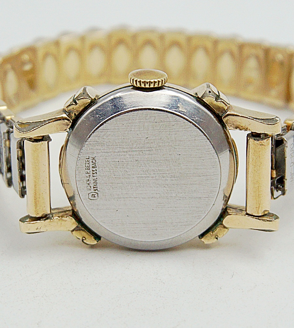 นาฬิกาเก่า NEVETS ไขลานสองเข็มครึ่ง (นาฬิกาผู้หญิง)