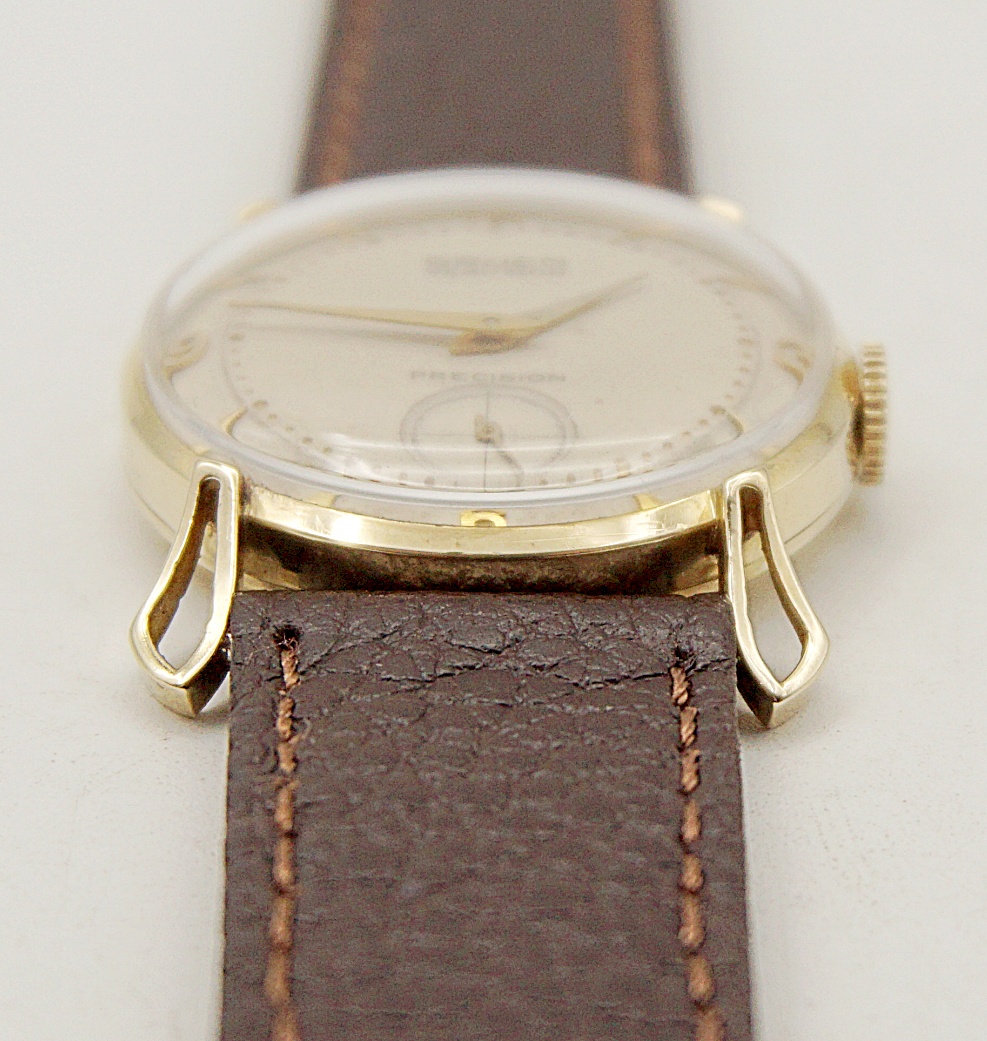 นาฬิกาเก่า GRUEN ไขลานสองเข็มครึ่ง (ตัวเรือนทอง 14K)