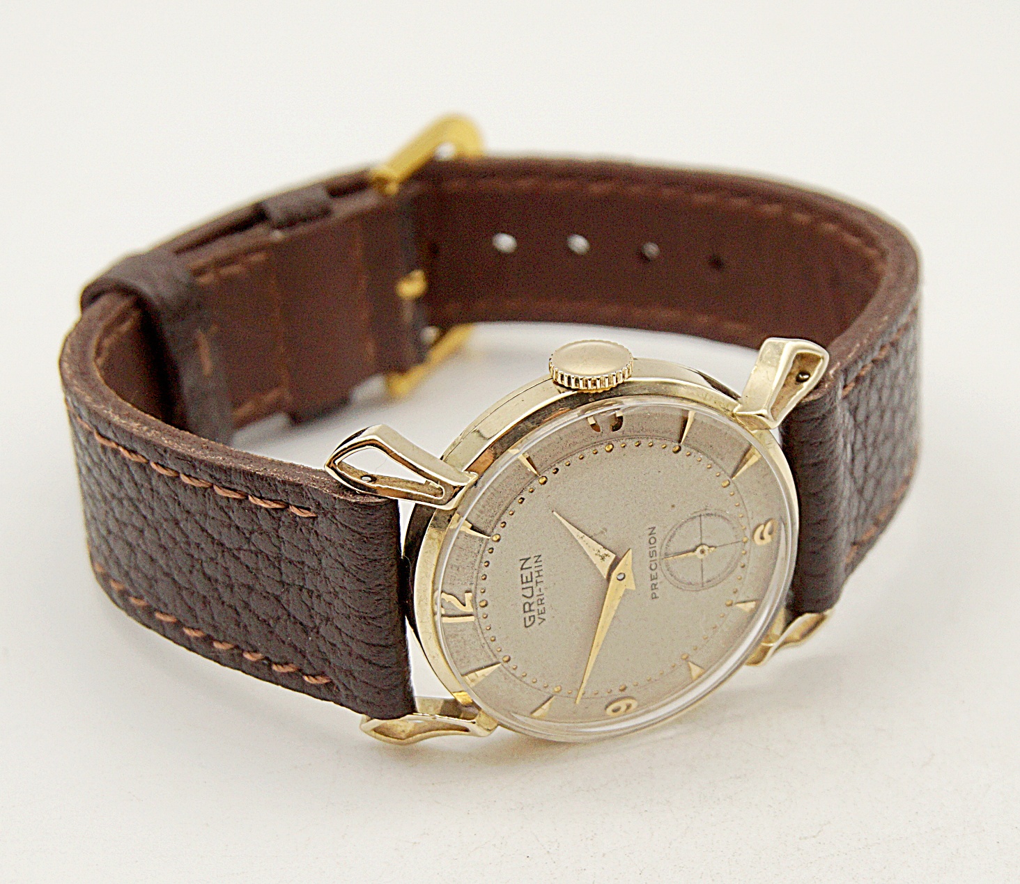 นาฬิกาเก่า GRUEN ไขลานสองเข็มครึ่ง (ตัวเรือนทอง 14K)