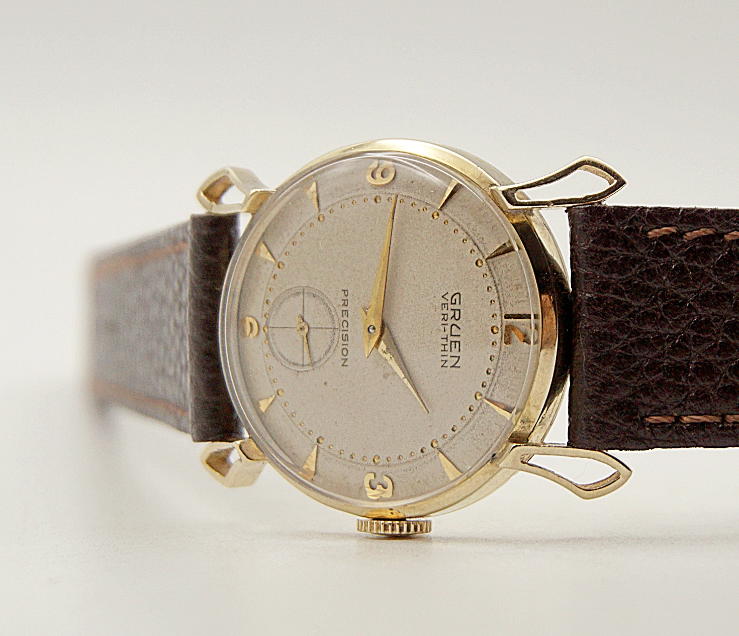 นาฬิกาเก่า GRUEN ไขลานสองเข็มครึ่ง (ตัวเรือนทอง 14K)