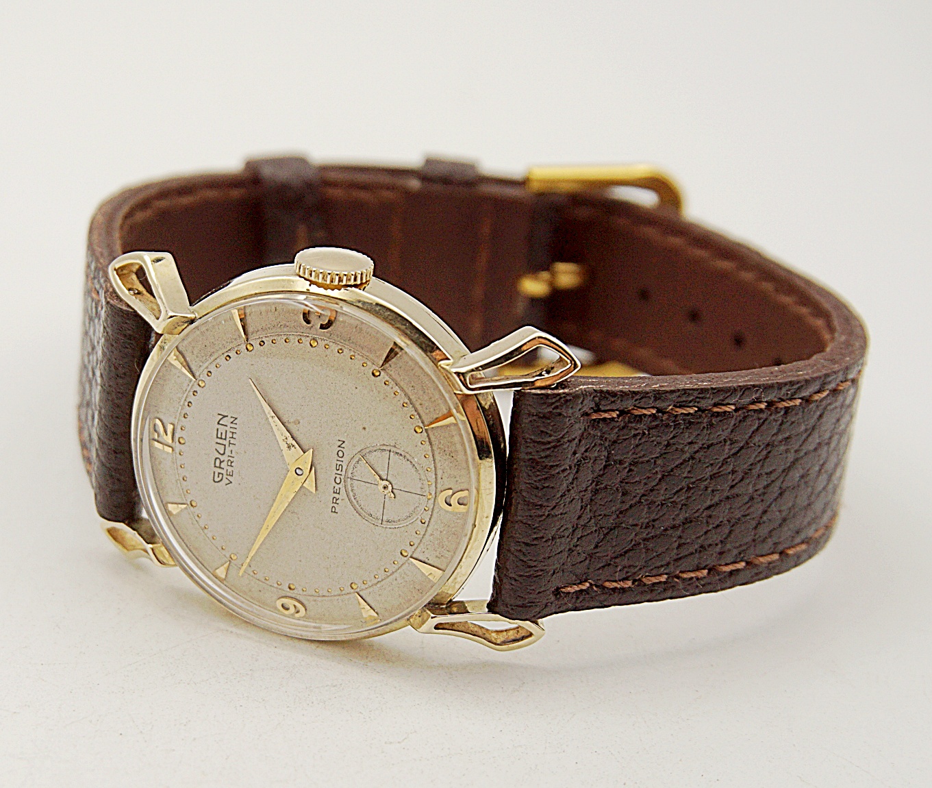 นาฬิกาเก่า GRUEN ไขลานสองเข็มครึ่ง (ตัวเรือนทอง 14K)