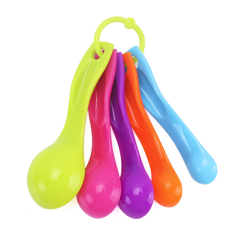 ชุดช้อนตวง พลาสติก 5 ชิ้น (การจัดเรียงสี จะแตกต่างไปในแต่ละชุด)