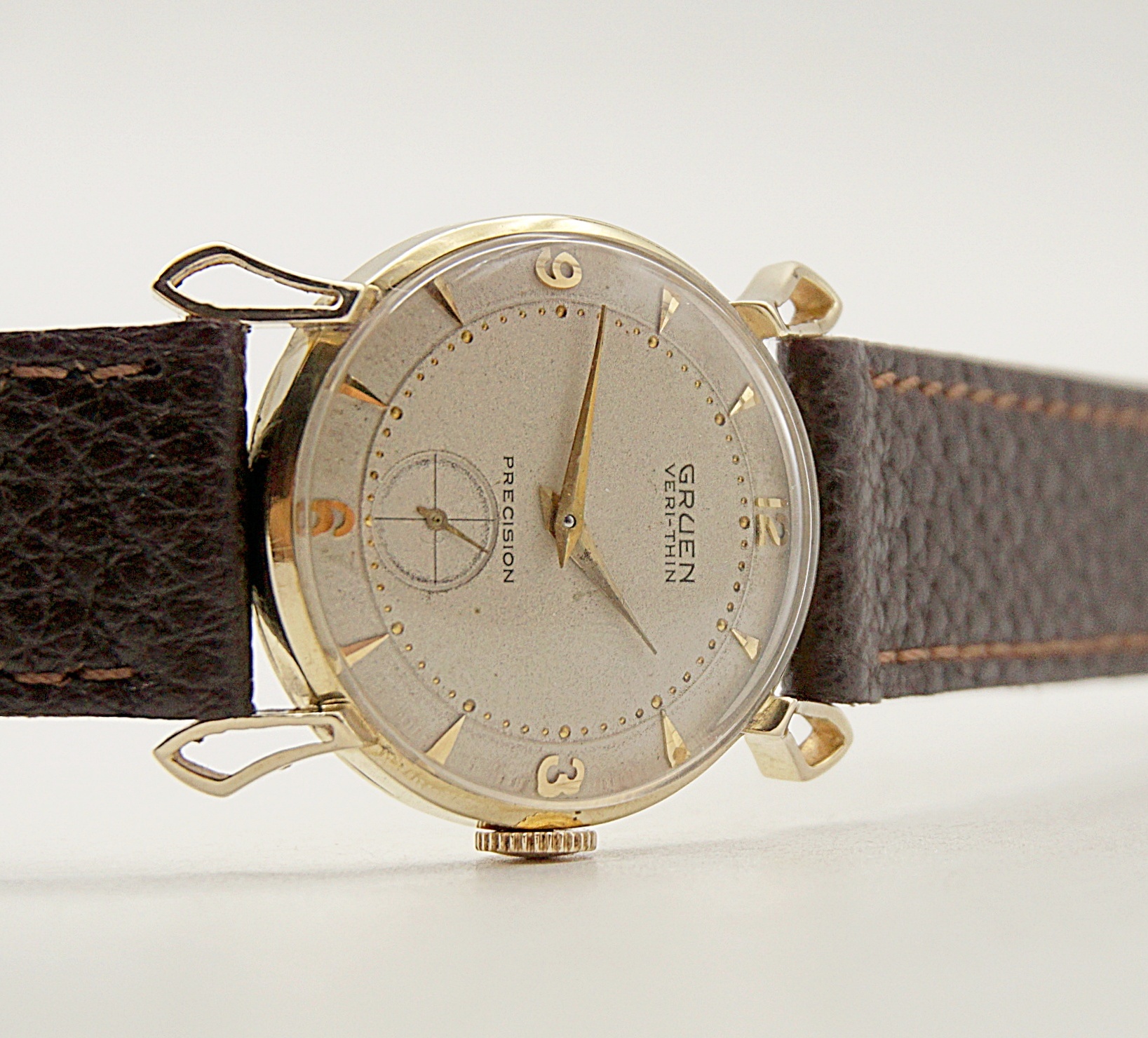 นาฬิกาเก่า GRUEN ไขลานสองเข็มครึ่ง (ตัวเรือนทอง 14K)