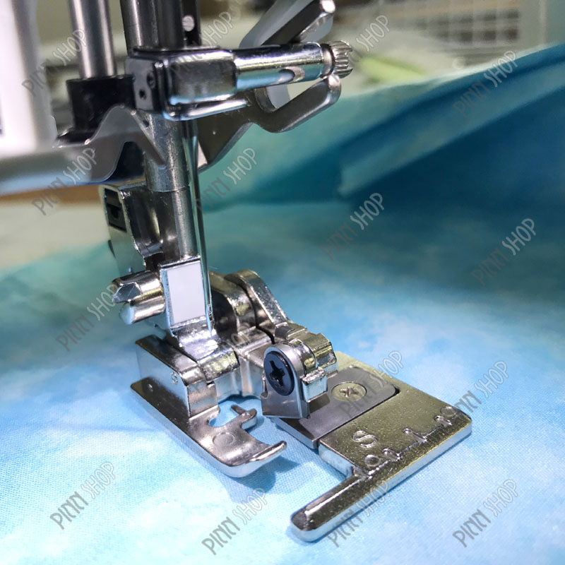 ตีนผีแซกเก็บริมพร้อมตัดผ้า