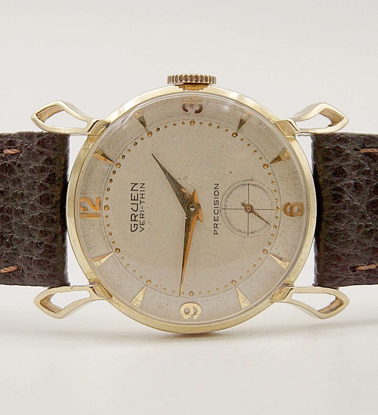 นาฬิกาเก่า GRUEN ไขลานสองเข็มครึ่ง (ตัวเรือนทอง 14K)