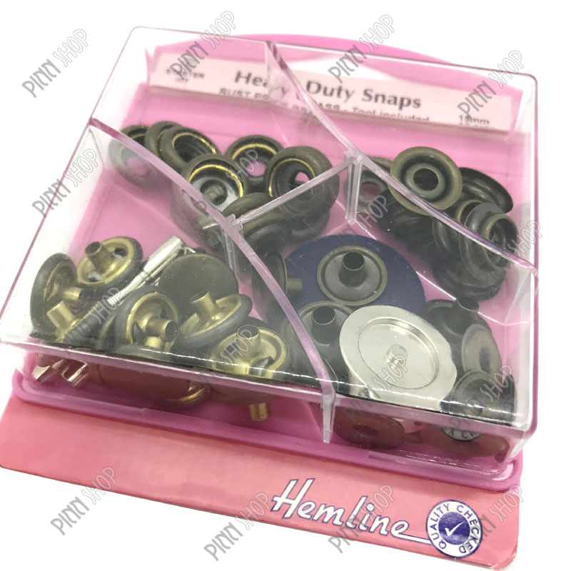 กระดุมตอกพร้อมเครื่องมือตอก