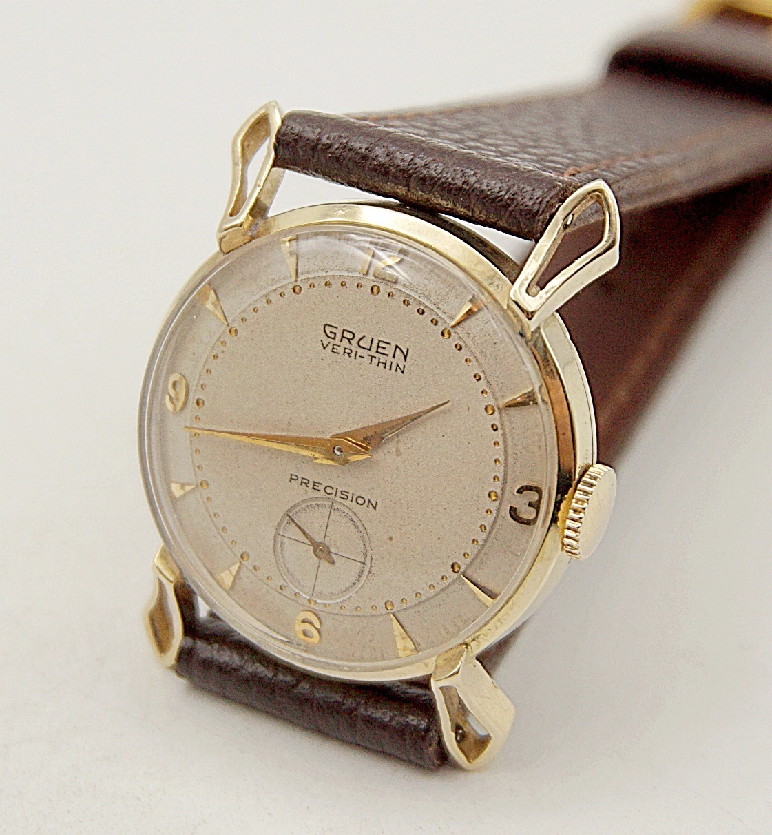 นาฬิกาเก่า GRUEN ไขลานสองเข็มครึ่ง (ตัวเรือนทอง 14K)