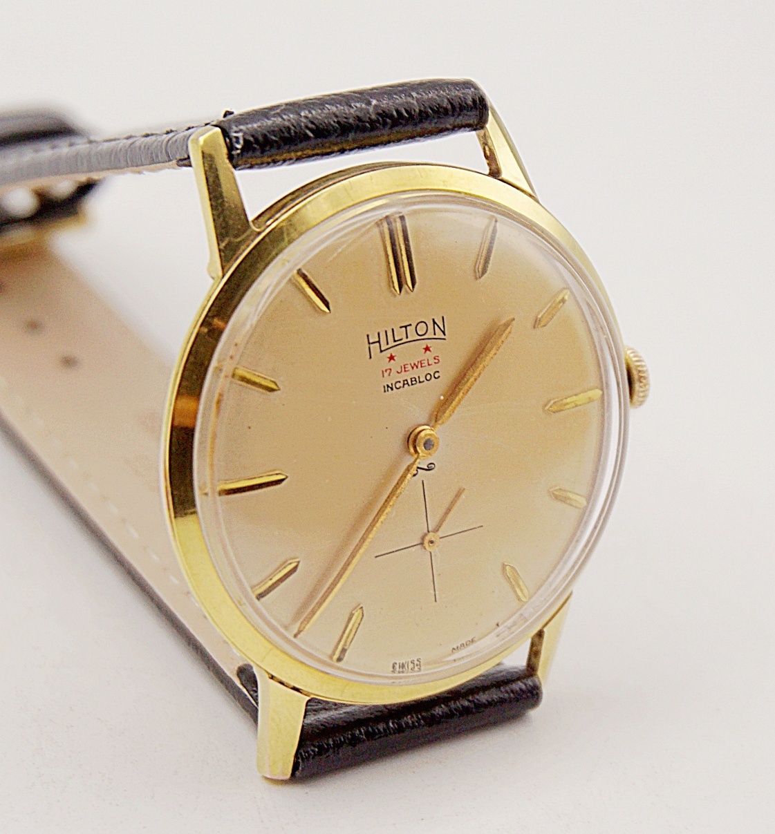 นาฬิกาเก่า HILTON ไขลานสองเข็มครึ่ง