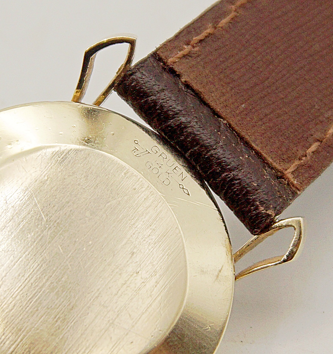 นาฬิกาเก่า GRUEN ไขลานสองเข็มครึ่ง (ตัวเรือนทอง 14K)