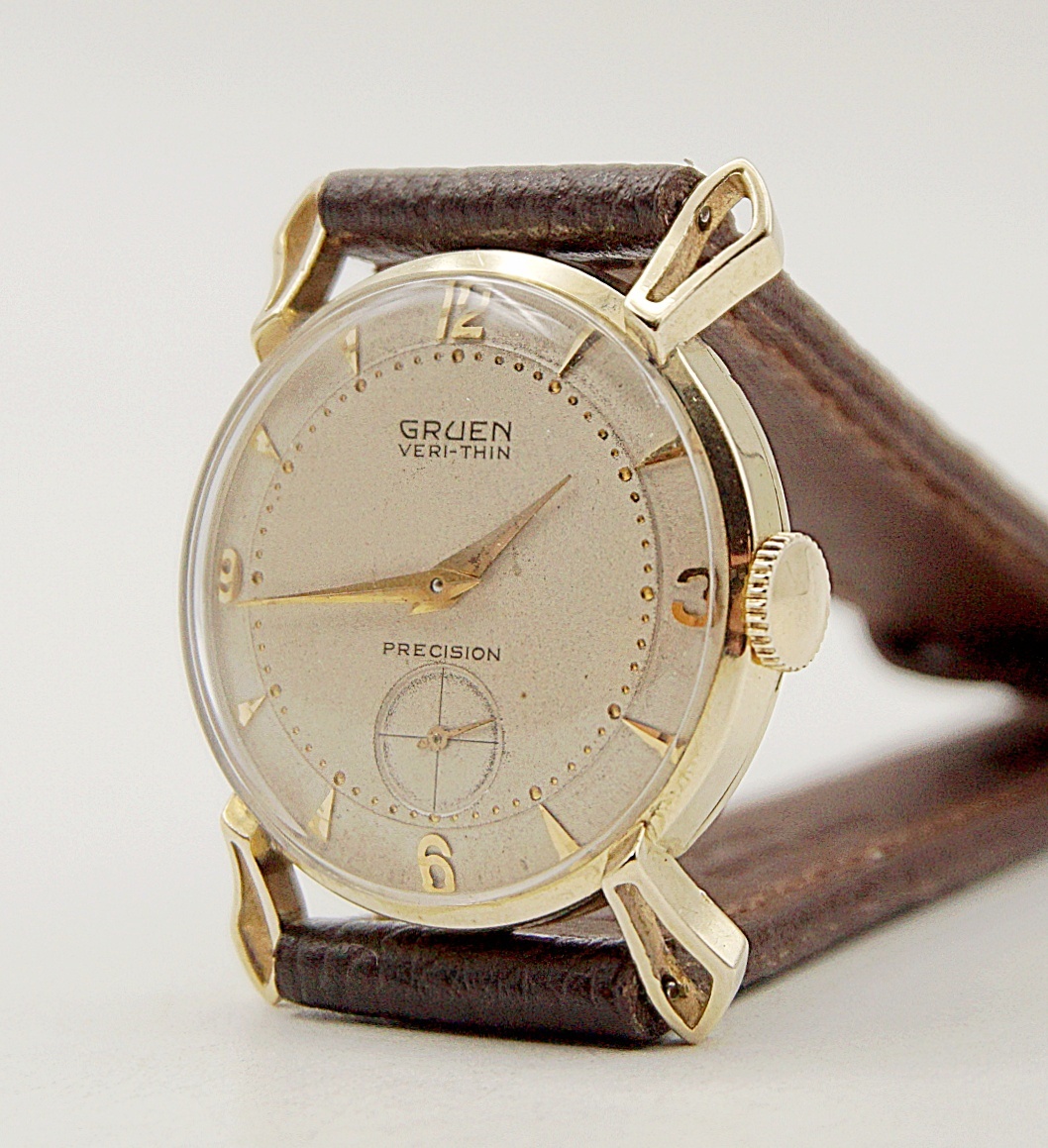 นาฬิกาเก่า GRUEN ไขลานสองเข็มครึ่ง (ตัวเรือนทอง 14K)