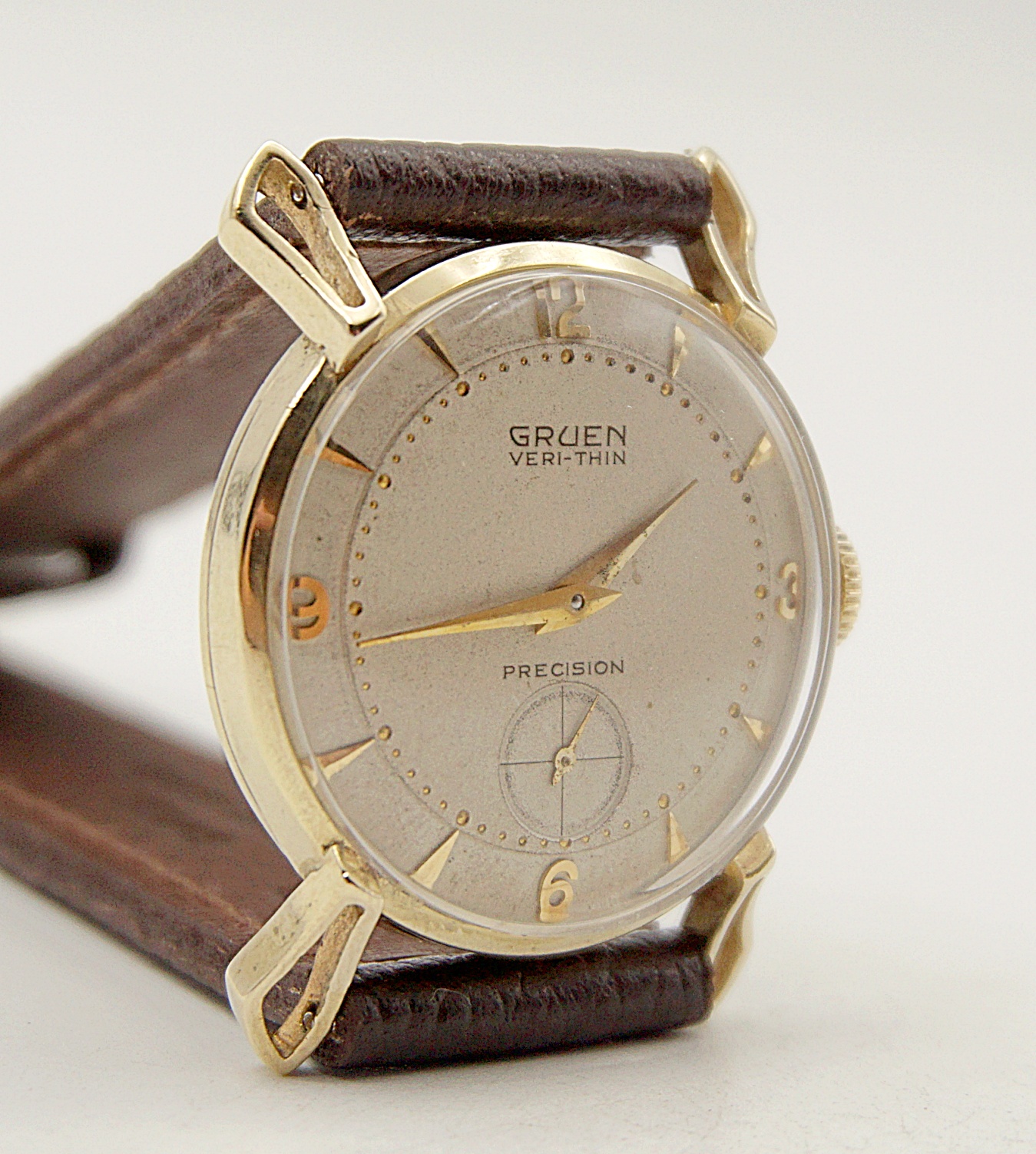 นาฬิกาเก่า GRUEN ไขลานสองเข็มครึ่ง (ตัวเรือนทอง 14K)