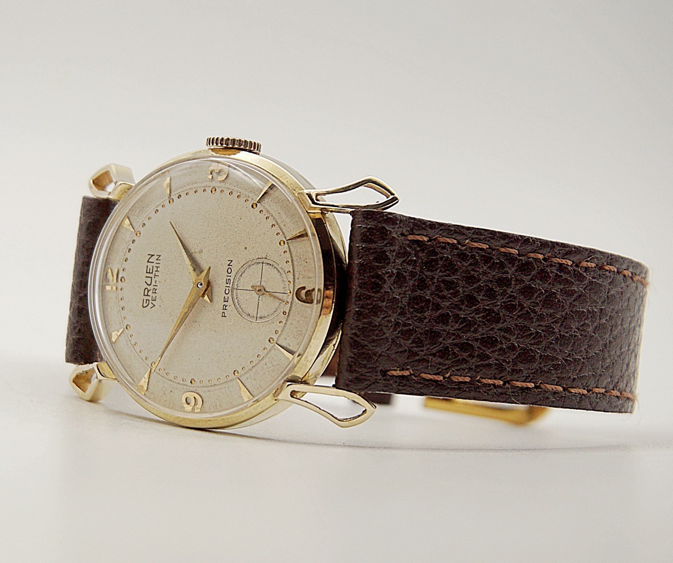 นาฬิกาเก่า GRUEN ไขลานสองเข็มครึ่ง (ตัวเรือนทอง 14K)