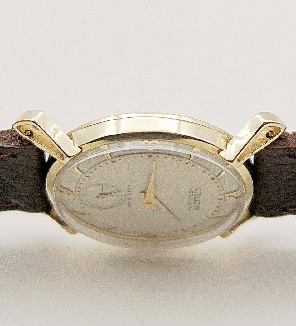 นาฬิกาเก่า GRUEN ไขลานสองเข็มครึ่ง (ตัวเรือนทอง 14K)