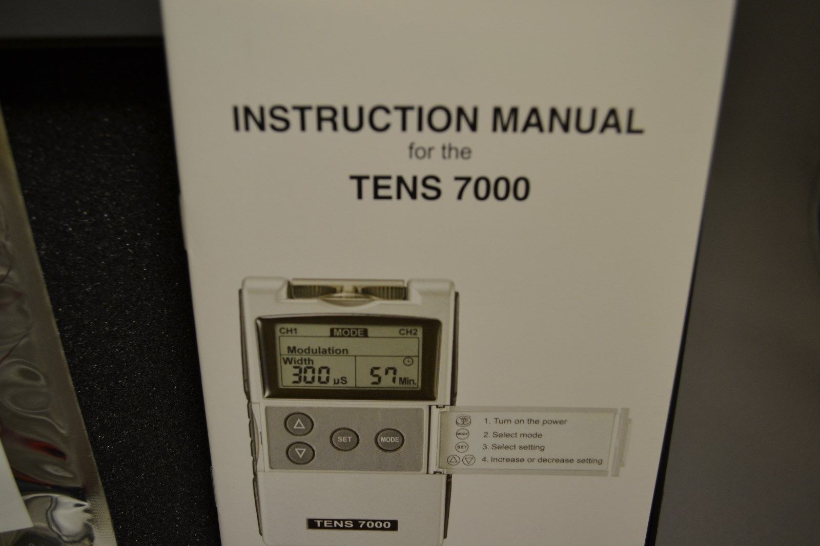 เครื่องกระตุ้นไฟฟ้าลดปวด แบบพกพา TENS 7000