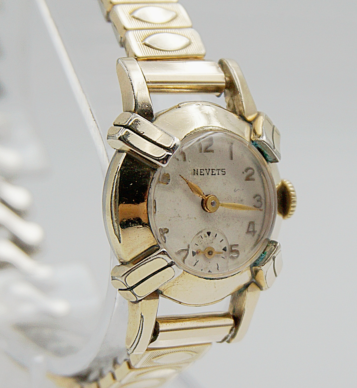 นาฬิกาเก่า NEVETS ไขลานสองเข็มครึ่ง (นาฬิกาผู้หญิง)