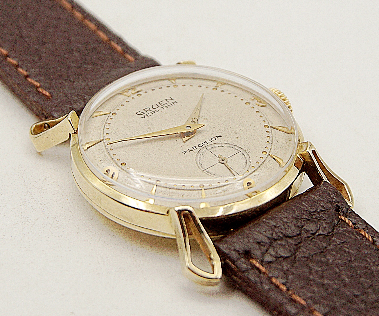 นาฬิกาเก่า GRUEN ไขลานสองเข็มครึ่ง (ตัวเรือนทอง 14K)