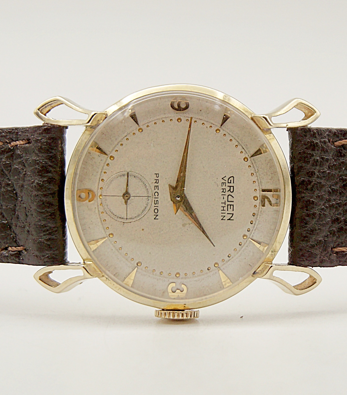 นาฬิกาเก่า GRUEN ไขลานสองเข็มครึ่ง (ตัวเรือนทอง 14K)